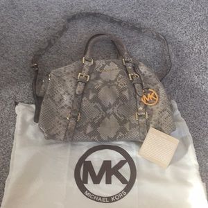 Michael Kors leather snakeskin purse.